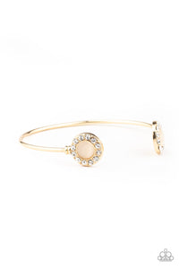 Paparazzi - Instant Illumination -  Gold Cuff Bracelet with Cat's Eye Stones