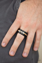 Load image into Gallery viewer, Paparazzi Battle Tank Men&#39;s Black Ring with Gold Bar accent
