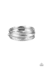 Load image into Gallery viewer, Paparazzi - The Customer is Always Bright - Set of 7 Silver Bangles
