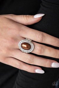 The Royale Treatment Brown Pearl Ring surrounded by Rhinestones around Oval Frame